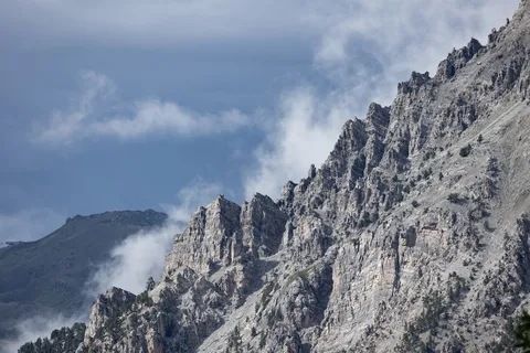 Rocky ridge in the clouds — Nicolas Marincic