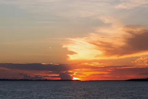 Sunset over the Amazon from the boat, Brazil — Nicolas Marincic