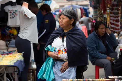 Indigenous woman at Otavalo market, Ecuador — Nicolas Marincic