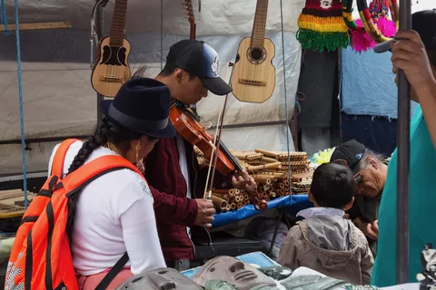 Violinist at Otavalo market, Ecuador — Nicolas Marincic