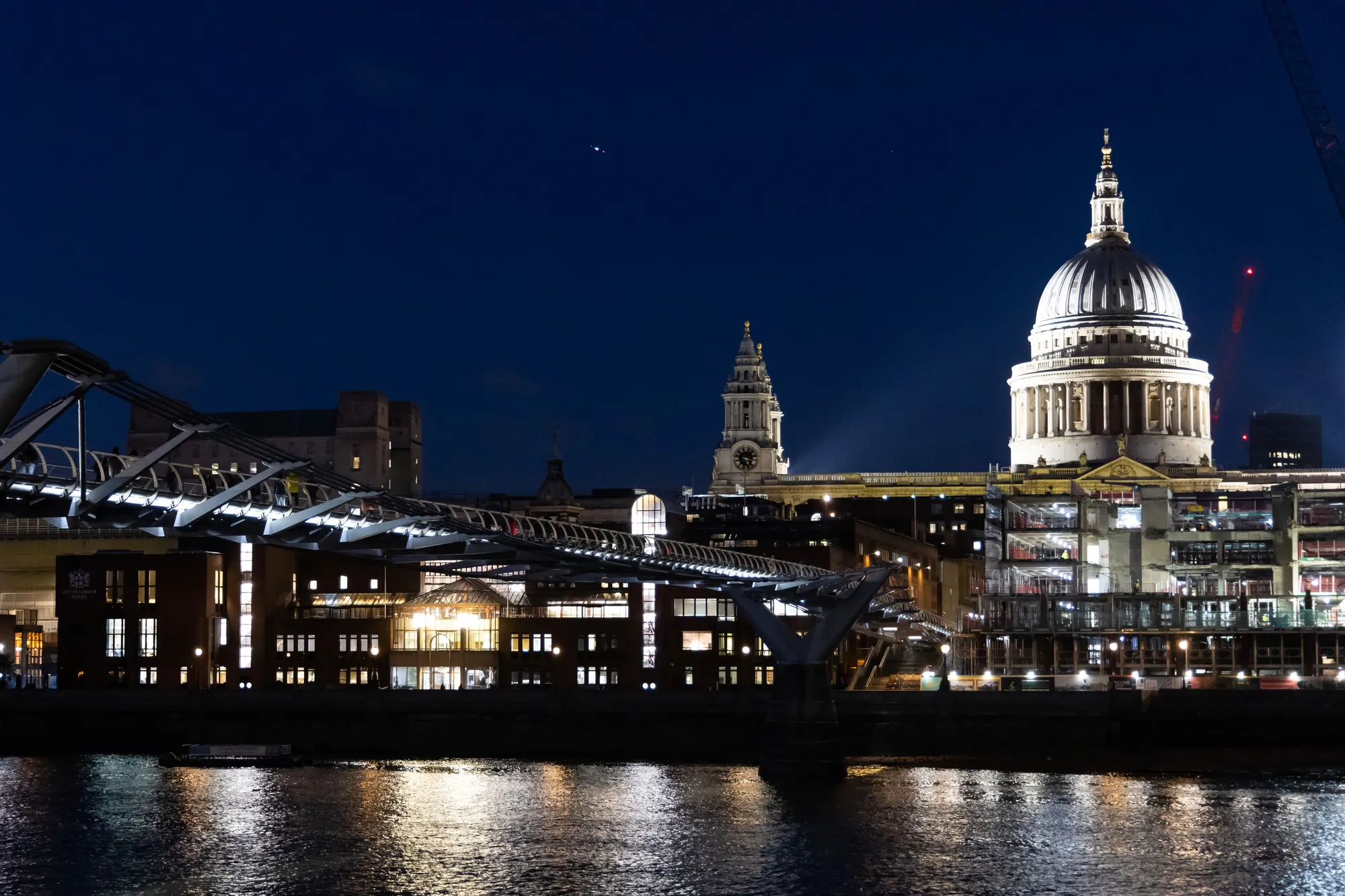 St Paul’s and the Millennium Bridge at night, United Kingdom — Nicolas Marincic