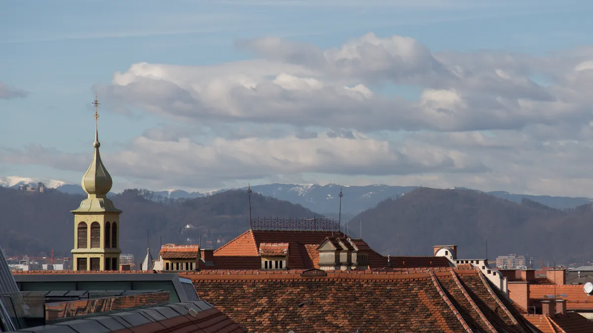Graz rooftops and mountains, Austria — Nicolas Marincic