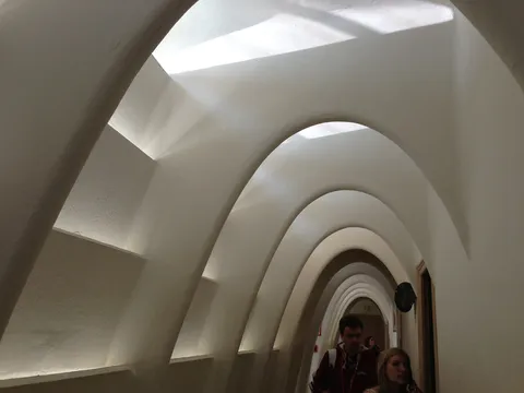 White catenary arches in the attic, Casa Batlló, Spain — Nicolas Marincic