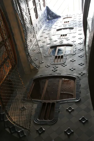 Blue-tiled light well, Casa Batlló, Spain — Nicolas Marincic