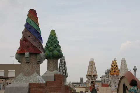 Trencadís chimneys on the roof of Palau Güell, Spain — Nicolas Marincic