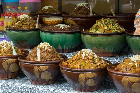 Bowls of condiments and pickled tea at the market, Burma — Nicolas Marincic
