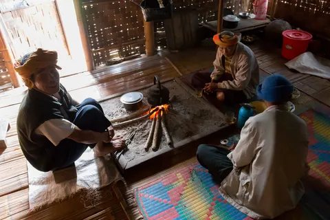 Villagers around the hearth on the Kalaw–Inle trek, Burma — Nicolas Marincic
