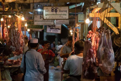 Butchers’ stalls at the market, Burma — Nicolas Marincic