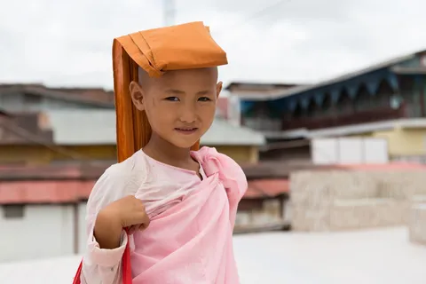 Little nun in pink robes, Burma — Nicolas Marincic