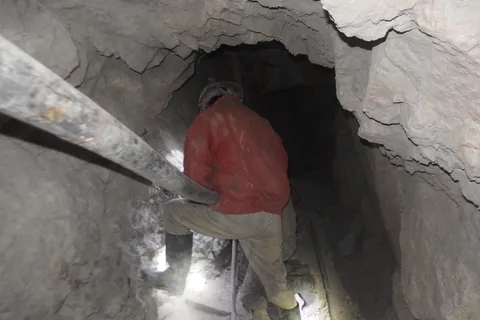 Miner at work in the Cerro Rico tunnels, Potosí, Bolivia — Nicolas Marincic