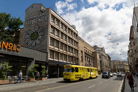 Yellow tram on a Sarajevo street, Bosnia and Herzegovina — Nicolas Marincic