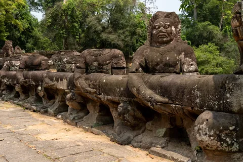 Giants holding the naga on the Preah Khan causeway, Cambodia — Nicolas Marincic
