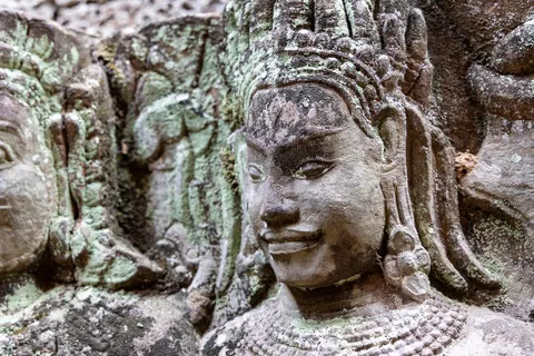 Smiling carved face, Terrace of the Leper King, Cambodia — Nicolas Marincic