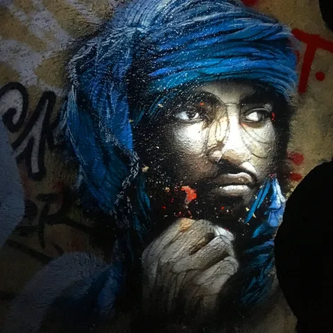 Tuareg portrait mural in the catacombs, France — Nicolas Marincic