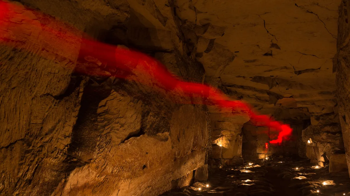 Red light trail along a NATO bunker gallery, France — Nicolas Marincic