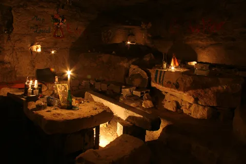 Candlelit quarry chamber, Montesson, France — Nicolas Marincic