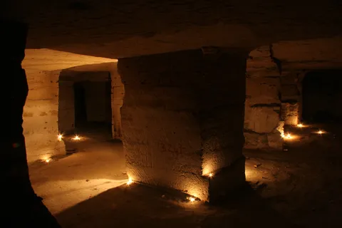 Candlelit pillars, Montesson quarries, France — Nicolas Marincic