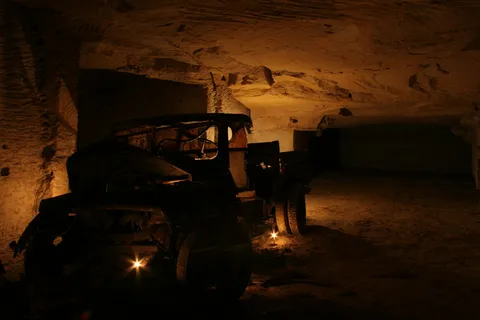 Old car wreck underground, Montesson quarries, France — Nicolas Marincic