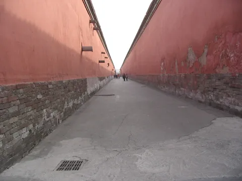Long red-walled alley, Forbidden City, China — Nicolas Marincic