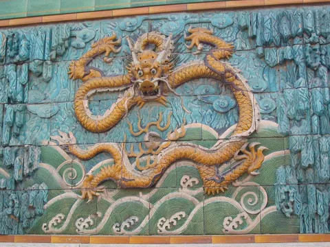 Yellow dragon on the Nine Dragon Wall, China — Nicolas Marincic