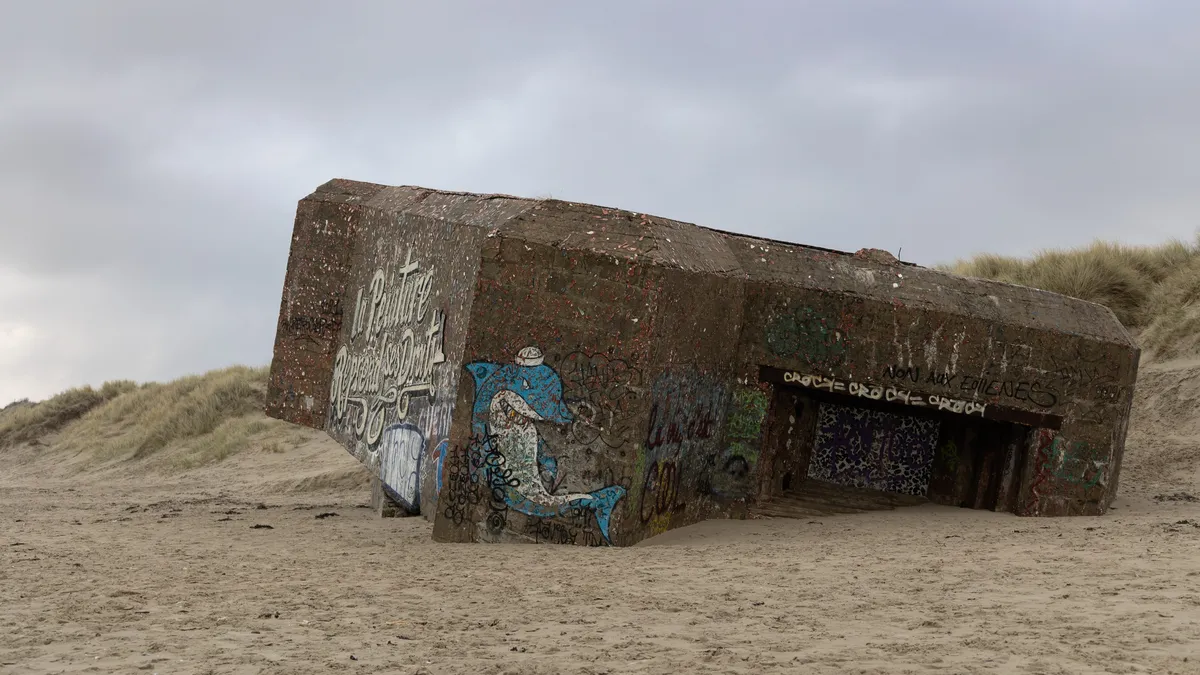 Tilted Atlantic Wall bunker in the dunes near Dunkirk, France — Nicolas Marincic