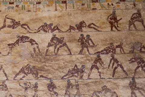 Wrestlers painted in a rock tomb at Beni Hasan, Egypt — Nicolas Marincic