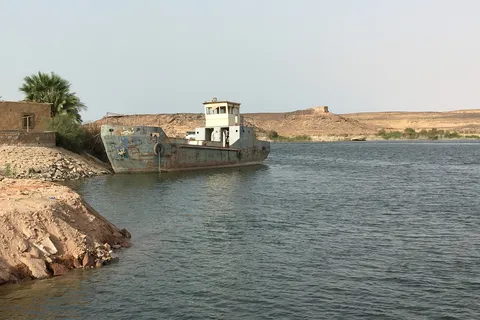 Wrecked boat on the lakeshore, Sudan — Nicolas Marincic