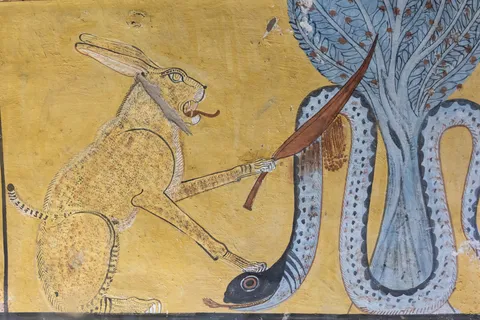 Chat terrassant le serpent Apophis, Deir el-Médineh, Égypte — Nicolas Marincic