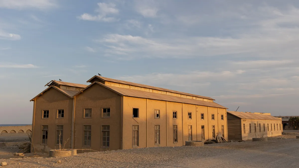 Abandoned phosphate warehouses at El Quseir, golden hour, Egypt — Nicolas Marincic