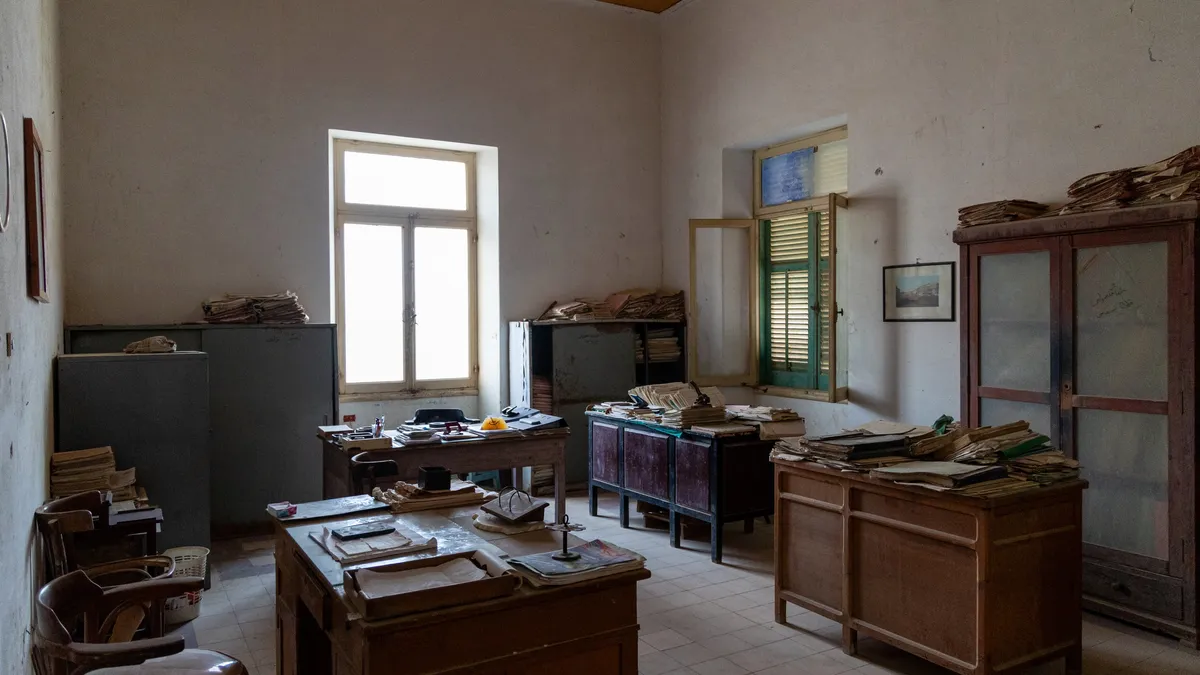 Abandoned phosphate company office with old files, Egypt — Nicolas Marincic