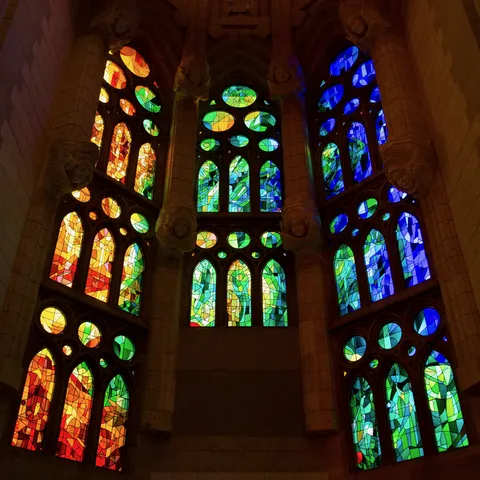 Warm and cool stained glass in the Sagrada Família, Spain — Nicolas Marincic