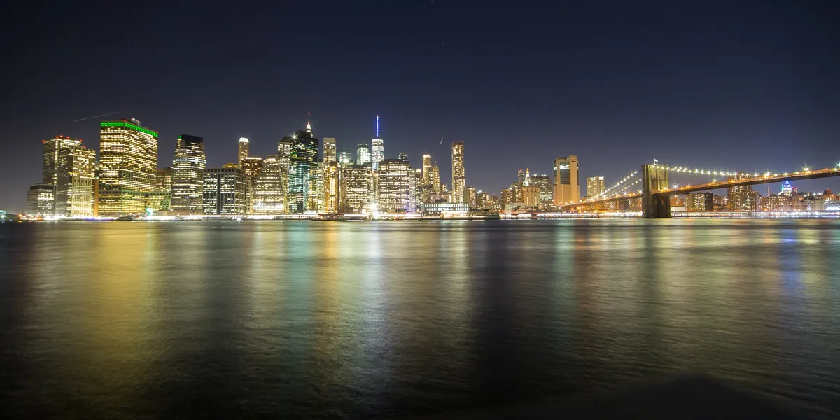 Lower Manhattan at night across the East River, United States — Nicolas Marincic
