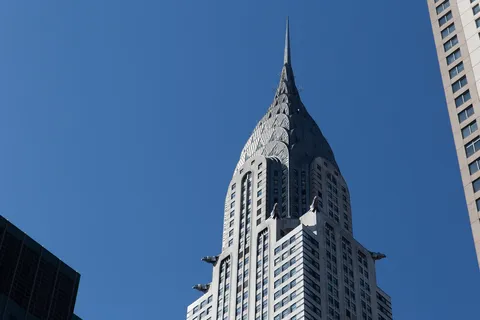 Chrysler Building spire against a deep blue sky, United States — Nicolas Marincic