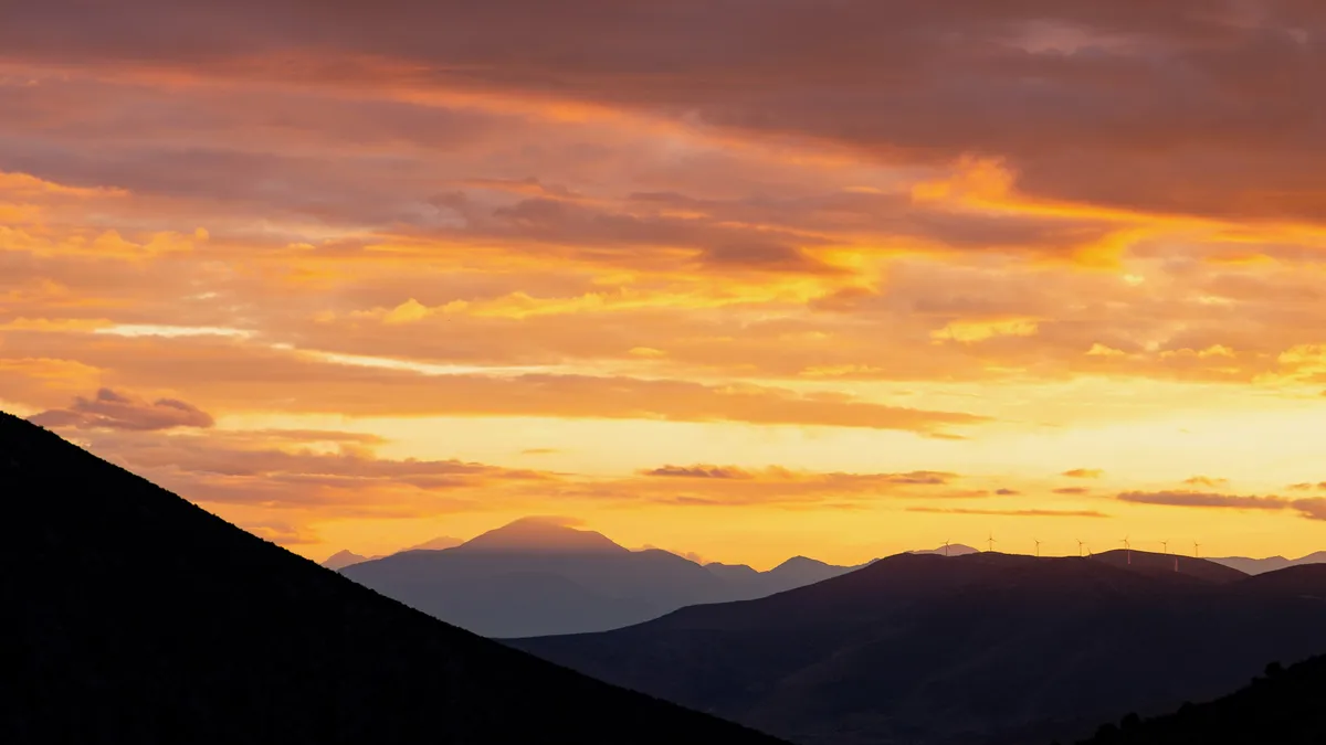 Fiery sunset over the mountains, Delphi, Greece — Nicolas Marincic