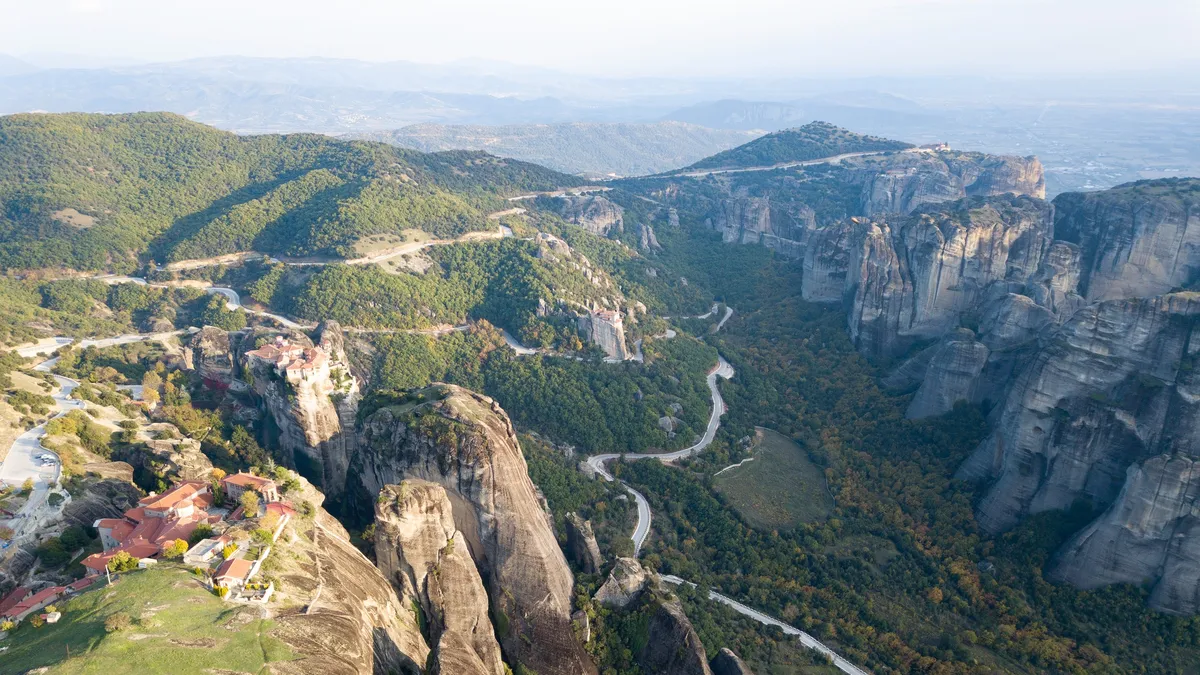 Monasteries and winding road of Meteora from above, Greece — Nicolas Marincic