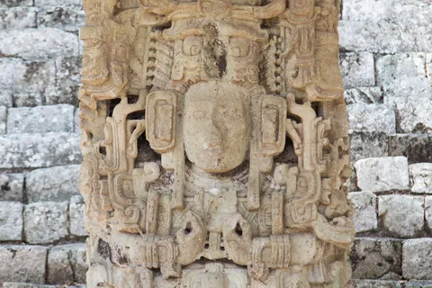 Carved stela on the Acropolis, Copán, Honduras — Nicolas Marincic