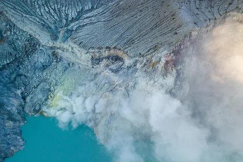 Sulphur smoke over the acid lake of Ijen, aerial view, Indonesia — Nicolas Marincic