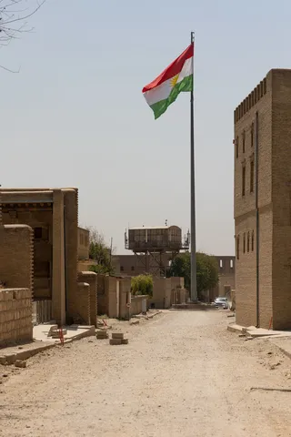 Kurdish flag over the Erbil Citadel, Iraq (Kurdistan) — Nicolas Marincic
