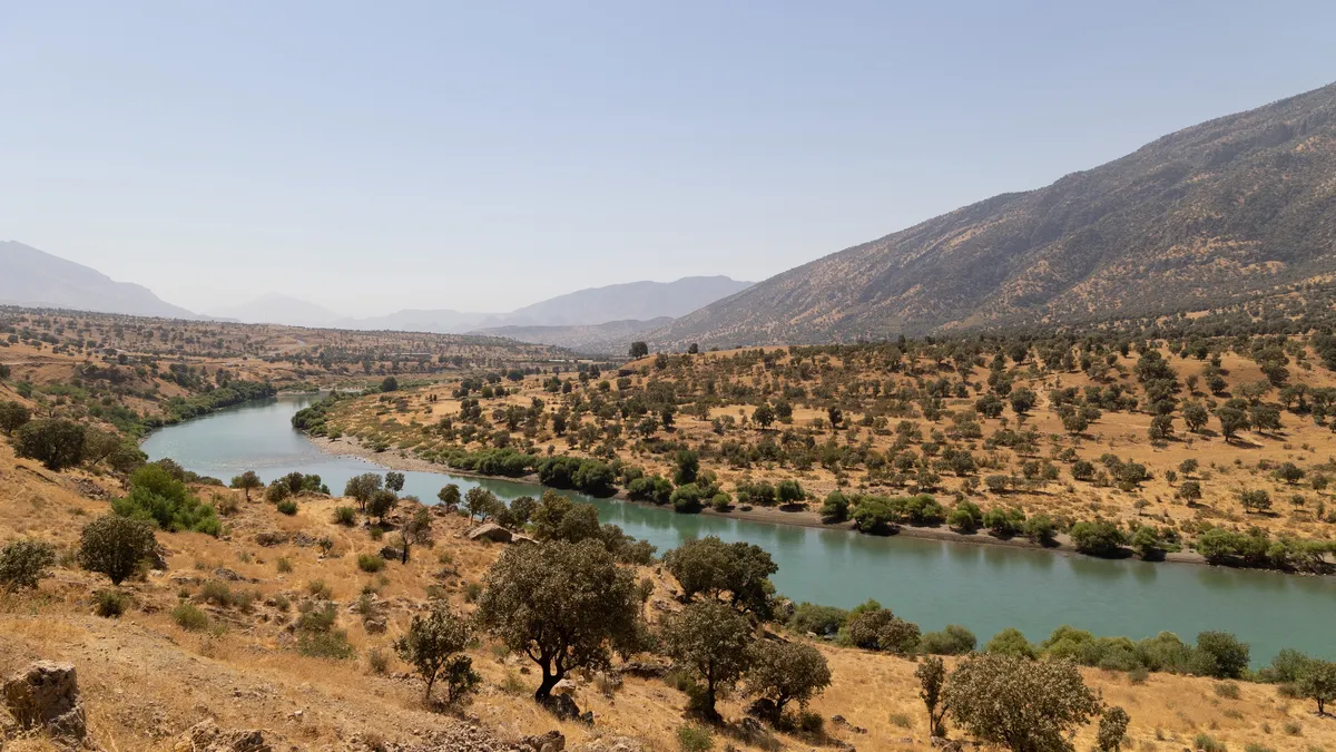 River winding through oak-covered hills, Iraq (Kurdistan) — Nicolas Marincic