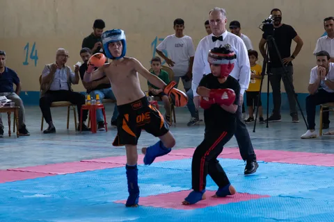 Young fighters in a kickboxing bout, Iraq (Kurdistan) — Nicolas Marincic