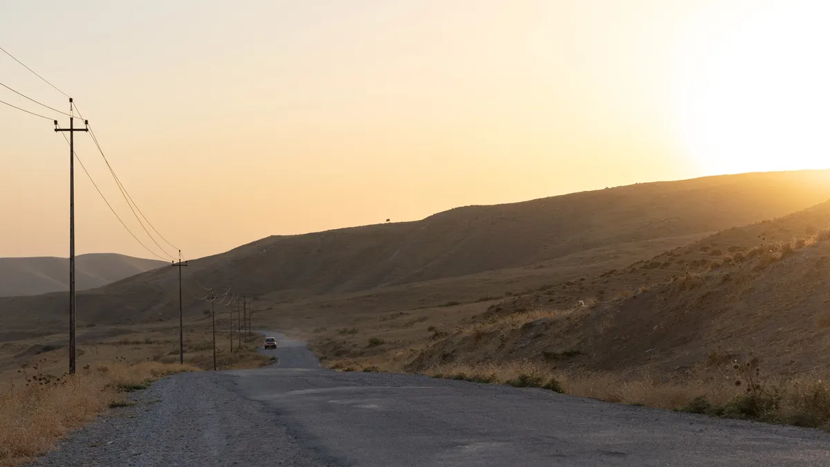 Road through the hills at sunset, Iraq (Kurdistan) — Nicolas Marincic