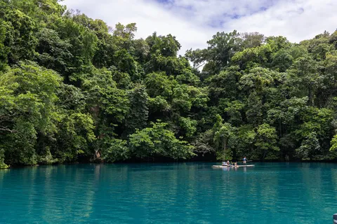 Blue Lagoon below jungle-clad cliffs, Port Antonio, Jamaica — Nicolas Marincic