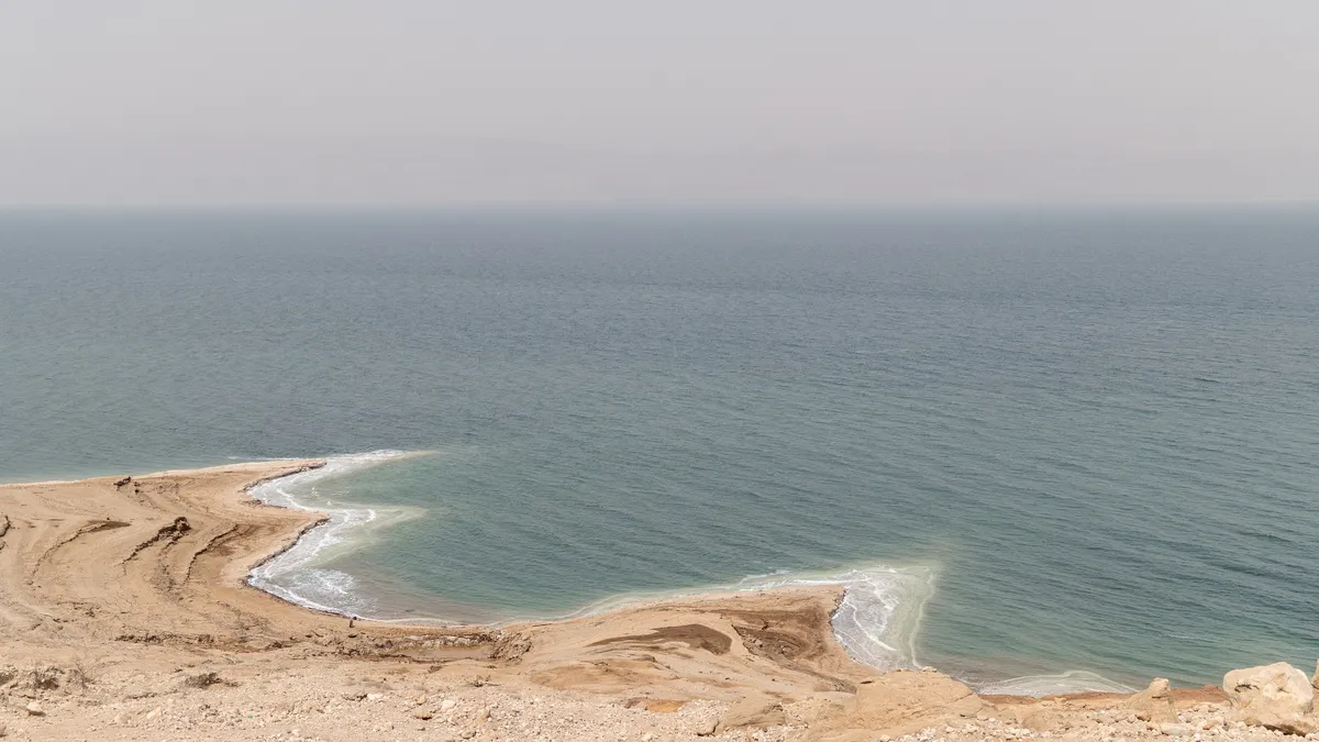 Salt-crusted shore of the Dead Sea, Jordan — Nicolas Marincic