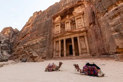 The Treasury with resting camels, Petra, Jordan — Nicolas Marincic