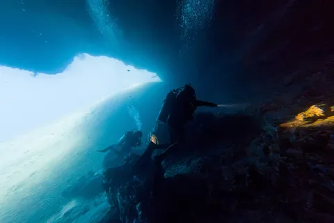 Diver in an underwater cave, Egypt — Nicolas Marincic