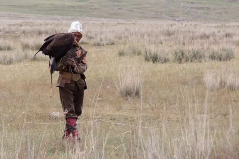 Eagle hunter with his bird, Kyrgyzstan — Nicolas Marincic
