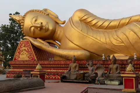 Golden reclining Buddha at That Luang, Vientiane, Laos — Nicolas Marincic