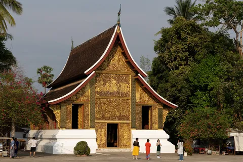 Wat Xieng Thong sanctuary in late light, Luang Prabang, Laos — Nicolas Marincic