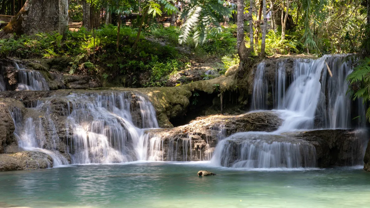 Turquoise cascades of Kuang Si, Laos — Nicolas Marincic