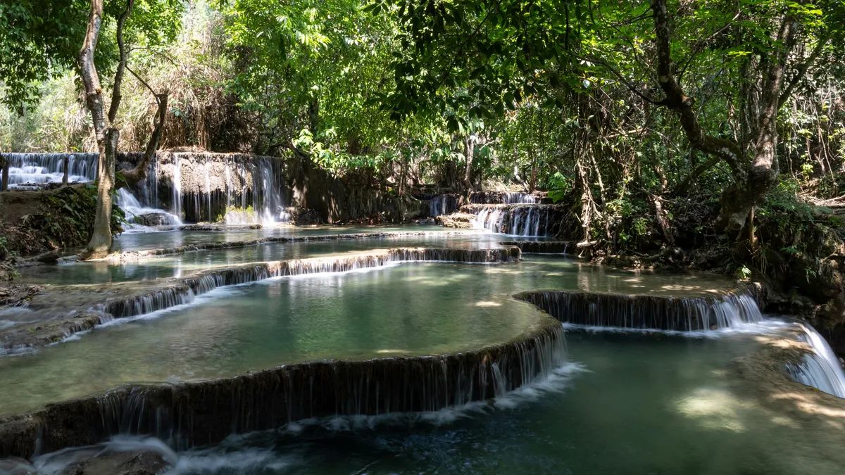 Turquoise pools of the Kuang Si Falls, Laos — Nicolas Marincic